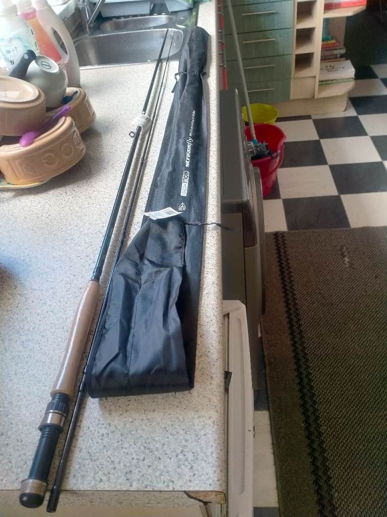 Fishing Rod with Travel Case – Good Condition