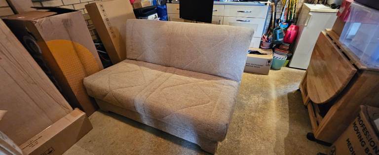 Compact 2 seater sofa bed. Excellent Condition