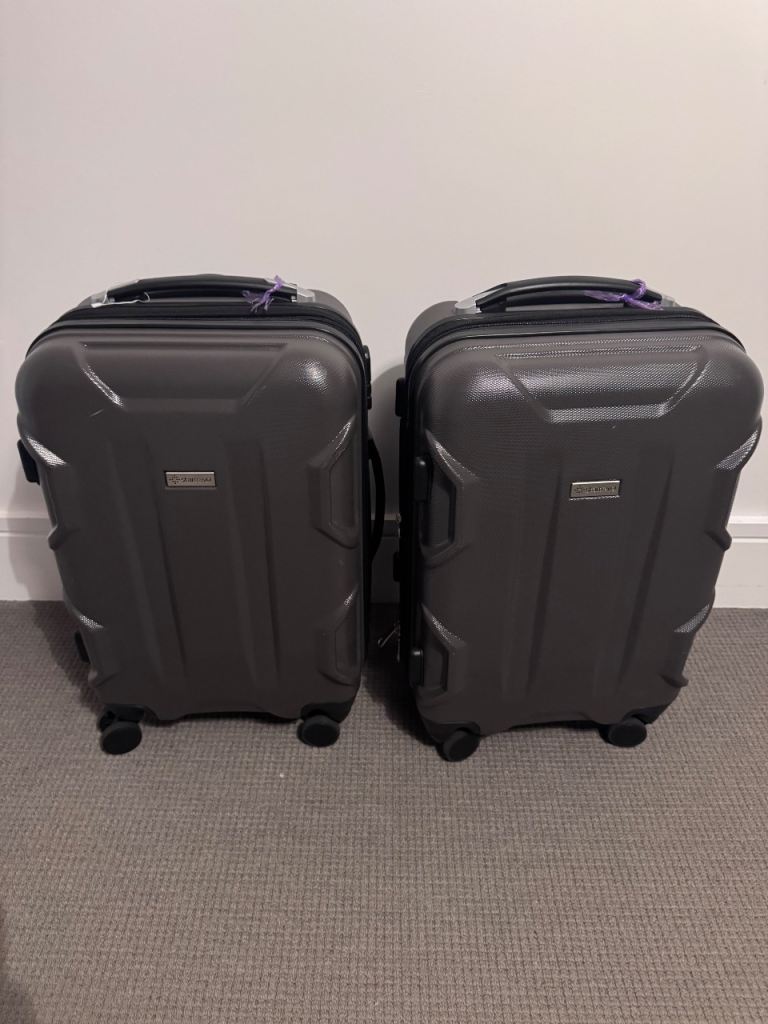 Two cabin suitcases (like new)