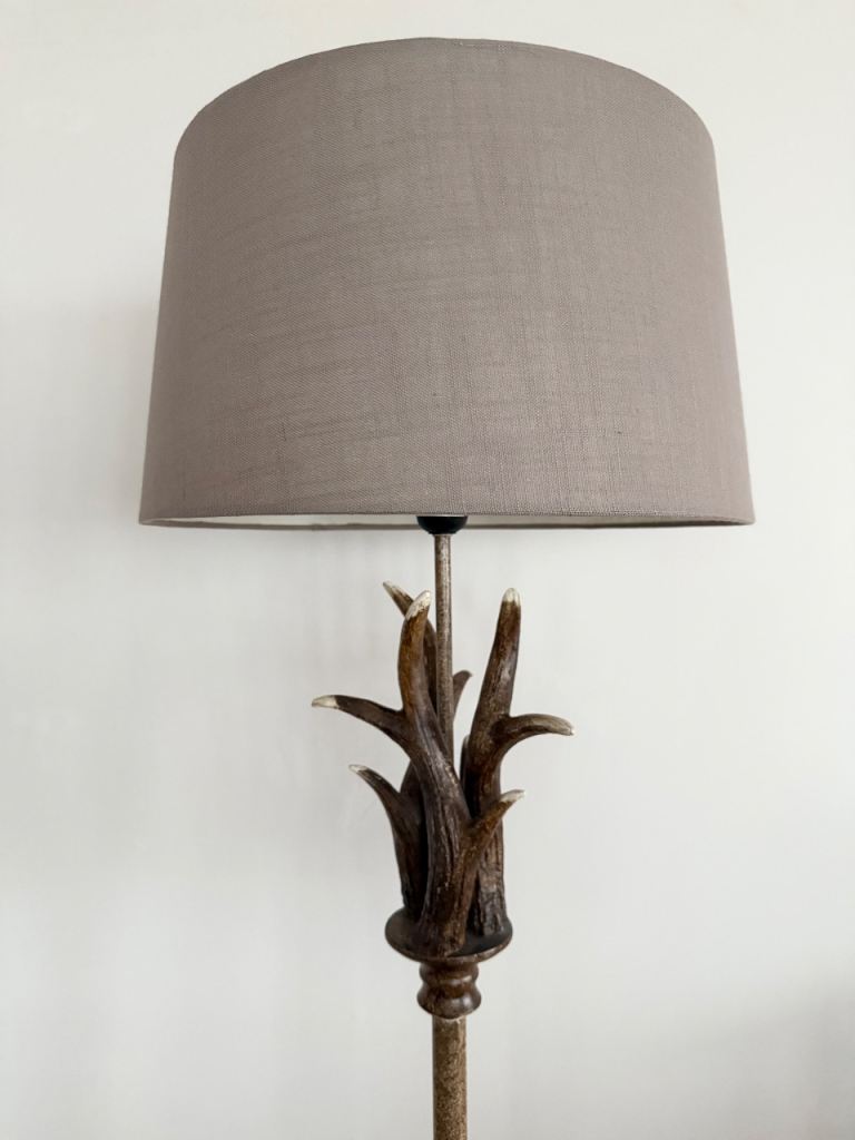 Rustic Floor Lamp with Antler Design and Brown Shade