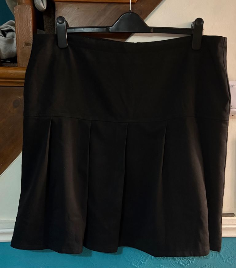 Drop pleat black school skirt. Size 38 in waist. Approx 14-15 years