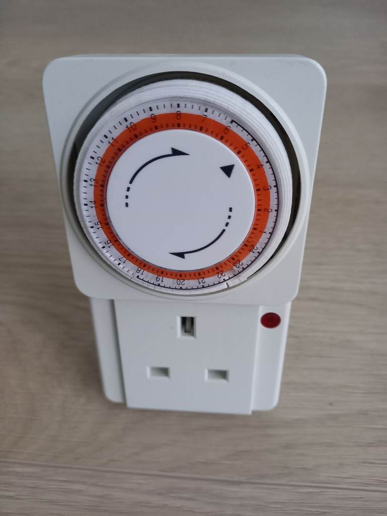 Mechanical electric plug in timer.