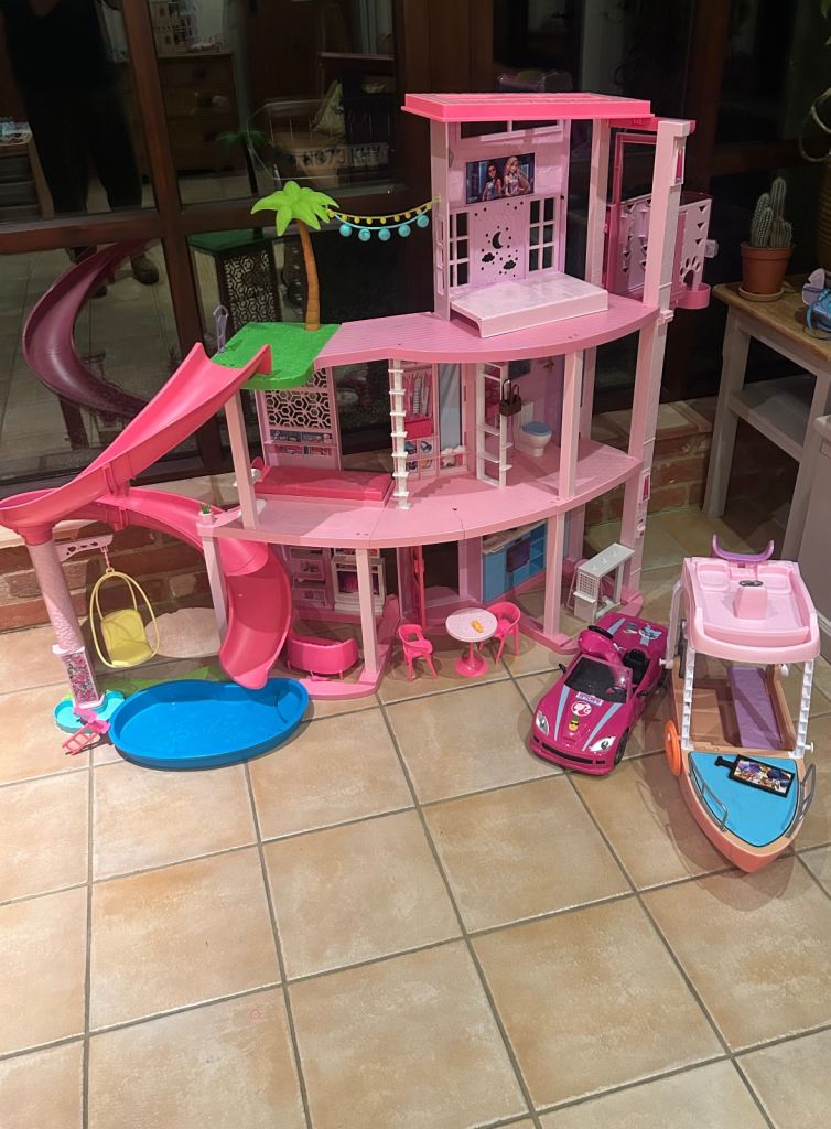 Barbie dream house / remote control car / Barbie boat