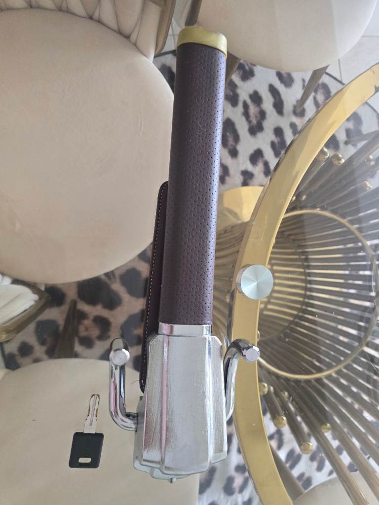 Maroon car Steering wheel lock