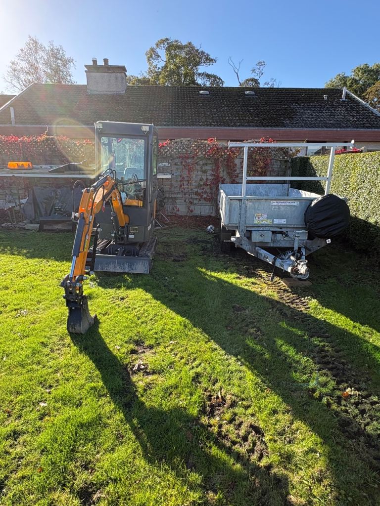 Digger and IFOR Williams tipping trailer 