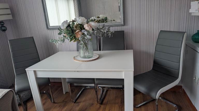 Table and 6 chairs.