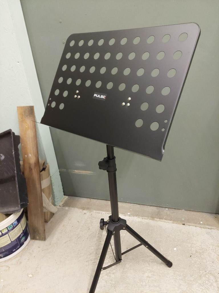 Music Stand. Black, sheet music, orchestra. 