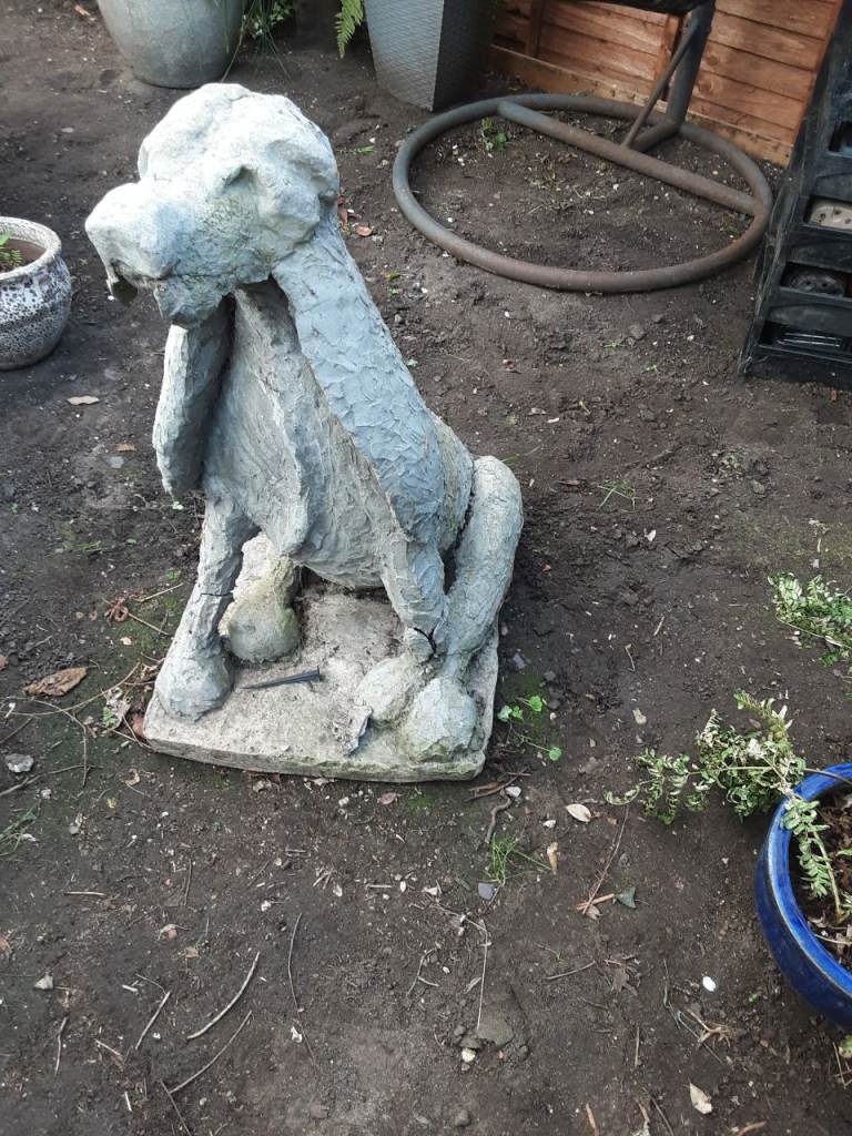 Concrete dog free garden statue