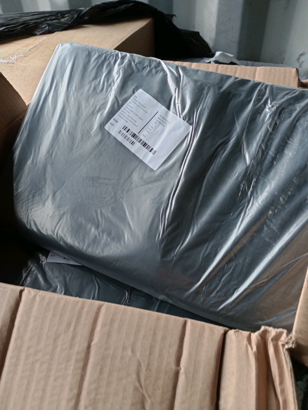 Black builders rubble plastic bags 
