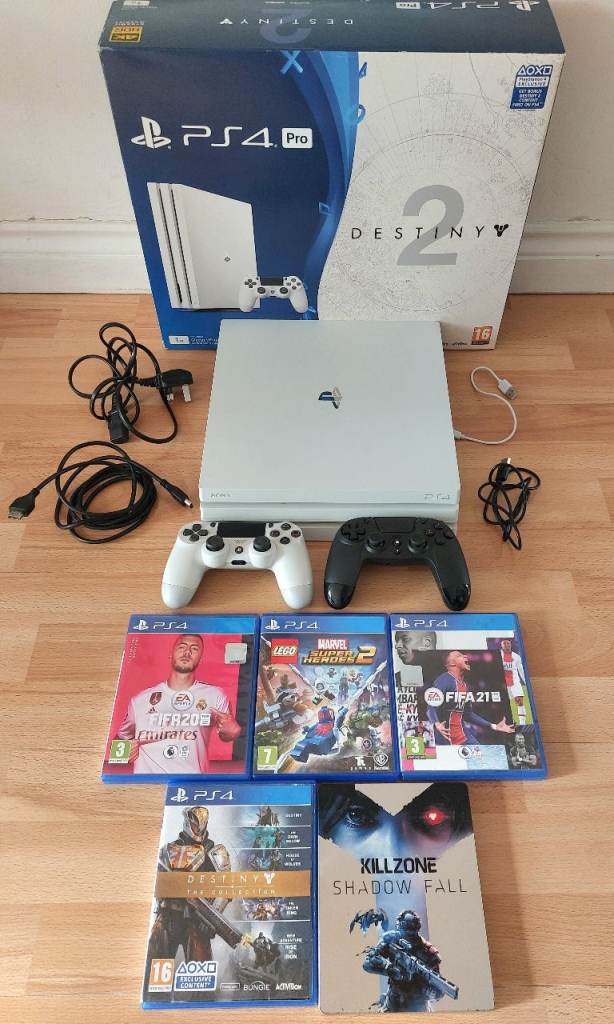 Boxed 1TB Playstation PS4 PRO with 2 controllers and games 
