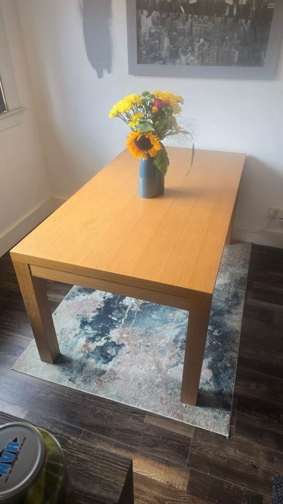 Oak dining table and six chairs