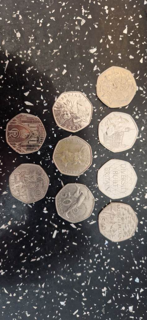 9 COLLECTABLE 50P COINS 