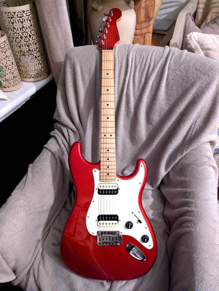 image for Candy apple red metallic paint Fender contemporary Squier. Double humbucker configuration