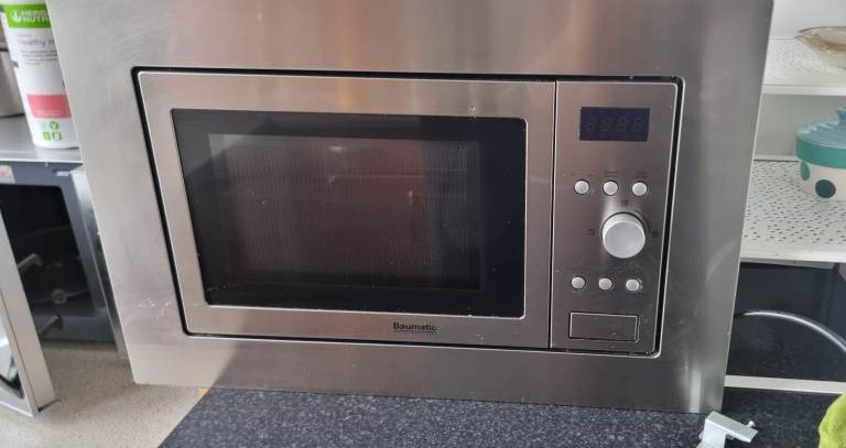 Microwave built in oven but works as it is also
