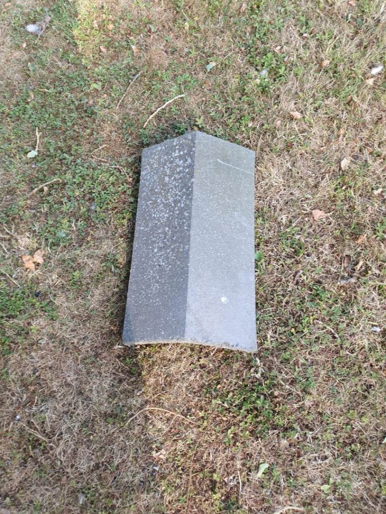 Grey Redland ridge tiles.