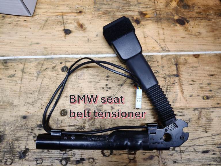 BMW seat belt tensioner, drivers side.