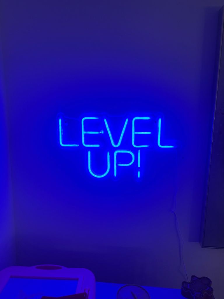 Neon 'LEVEL UP!' Wall Sign – Blue Light