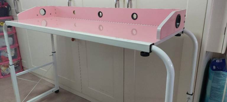 Over bed table or computer desk.