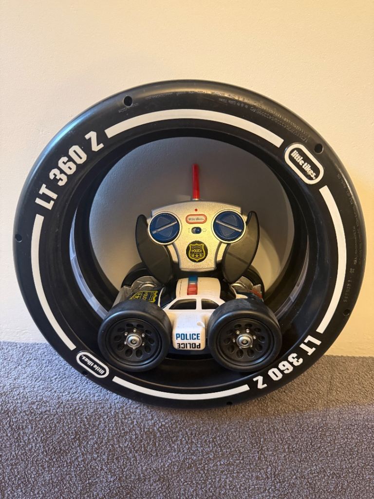 Spinning police car children’s toy 