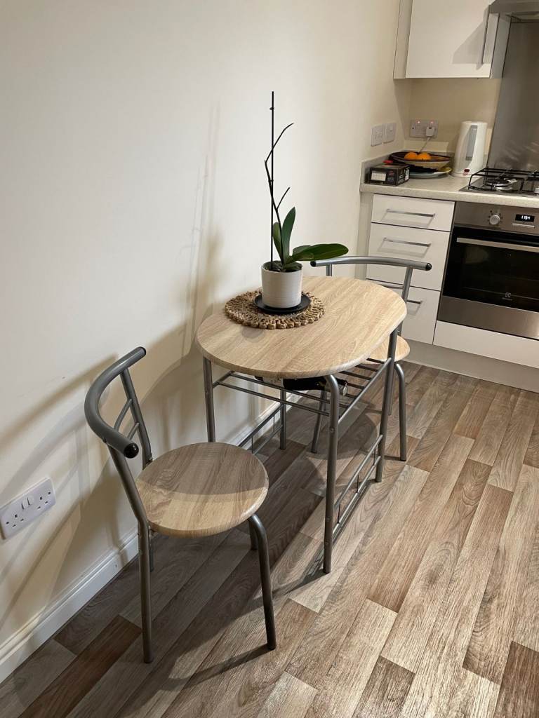 Compact kitchen dining table & 2 matching chairs (wine not included)