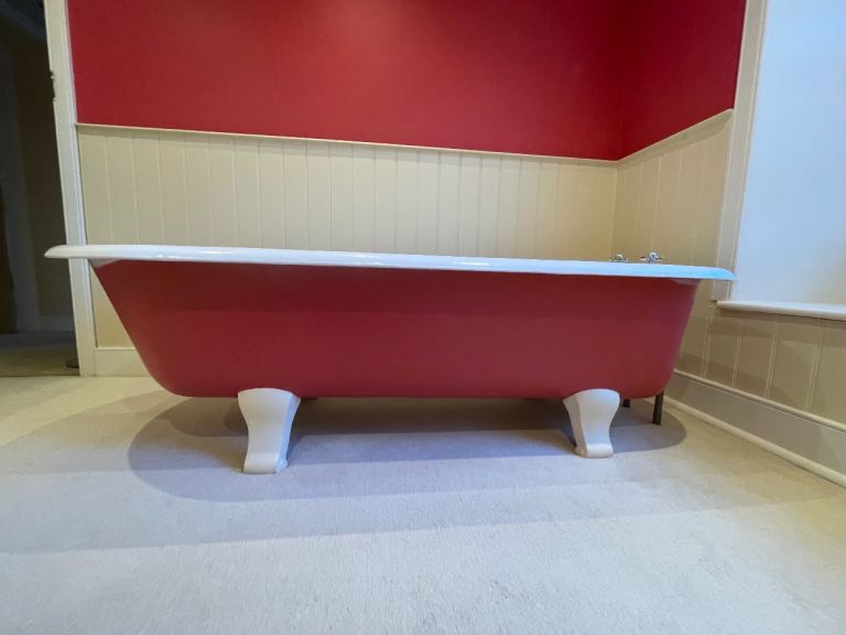Cast iron roll top bath