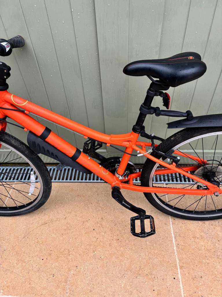 Boys Orange Carrera Saruna bike size 24”