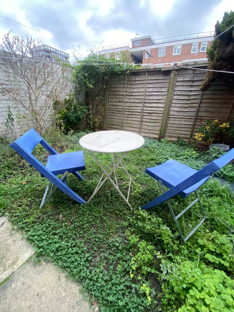 2 folding chairs and table