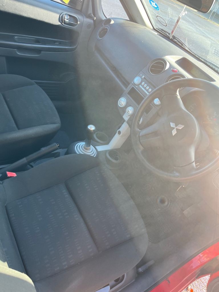 Mitsubishi colt 2007 red 3 door low miles 6 months mot, some history cheap tax and insurance