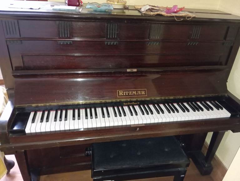 Riztmar upright piano in good condition