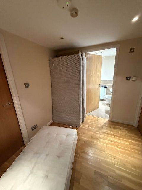 single bed and spare matress