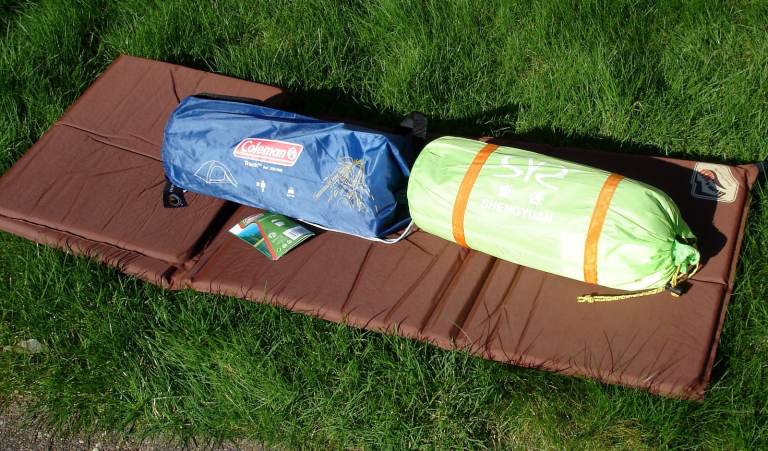 Tents x 2 (2 person, new) and a sleeping mat, plus airbed
