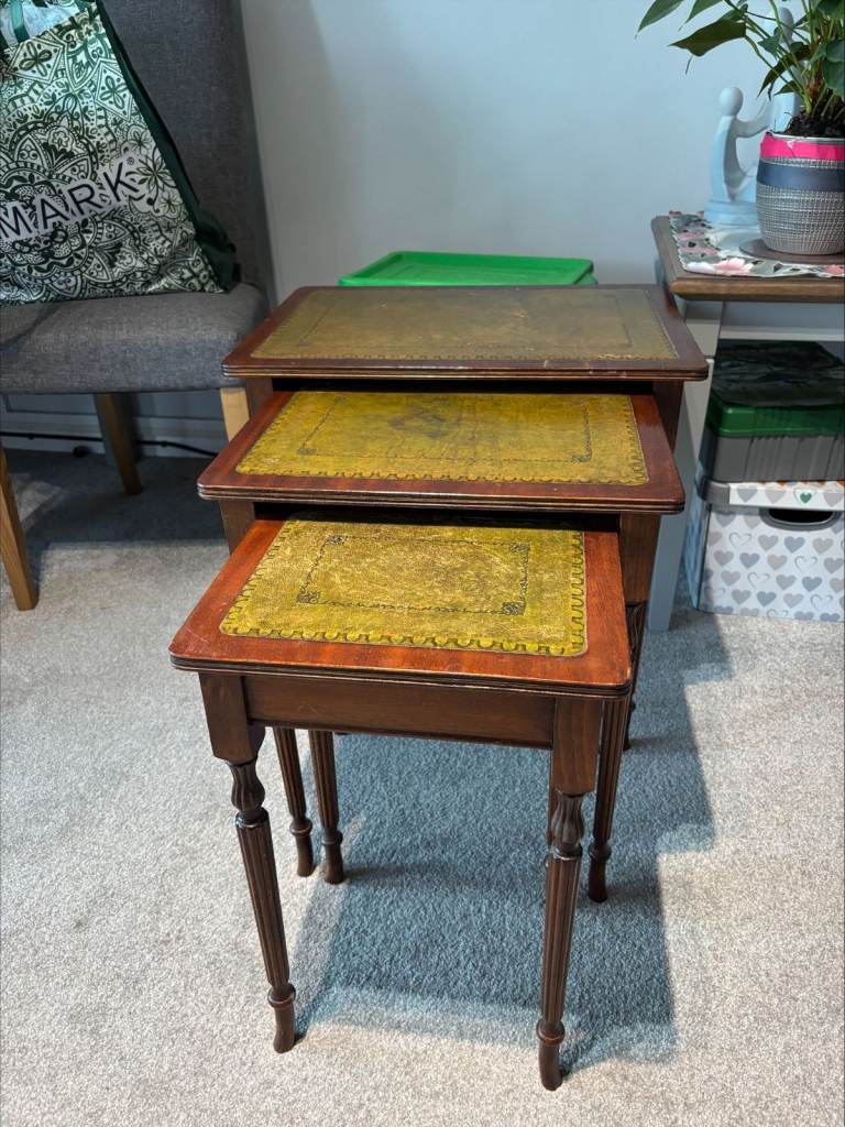 Leather topped nest of tables