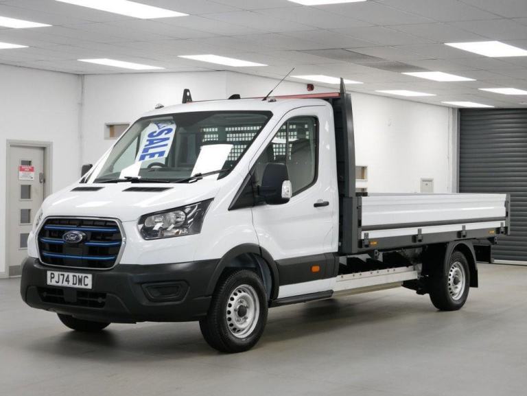 74 FORD E-TRANSIT 350 RWD 68 KWH 184 BHP LONG LEADER PREMIUM DROPSIDE ( AIR CON)