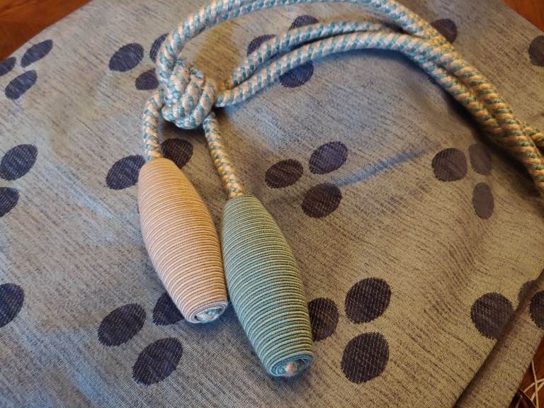 Pair of pale blue lined curtains