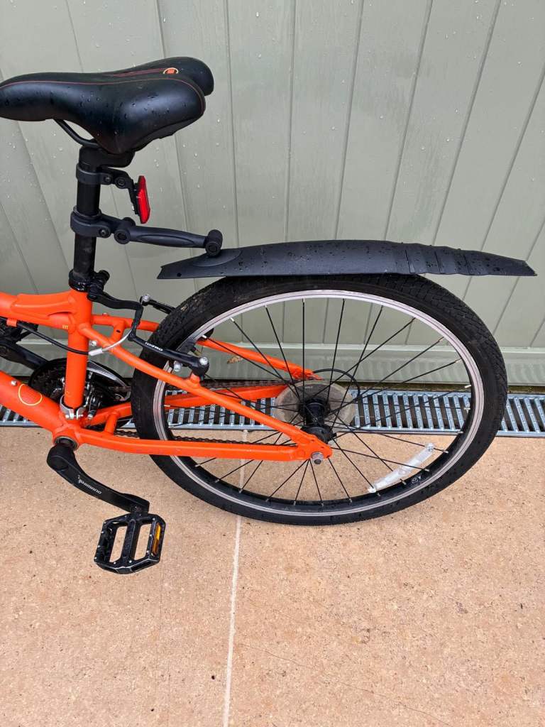 Boys Orange Carrera Saruna bike size 24”