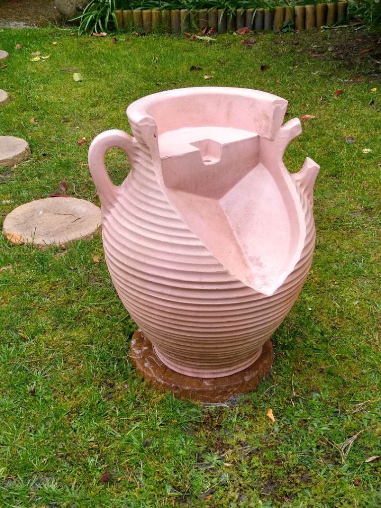Mock Grecian urn fountain base