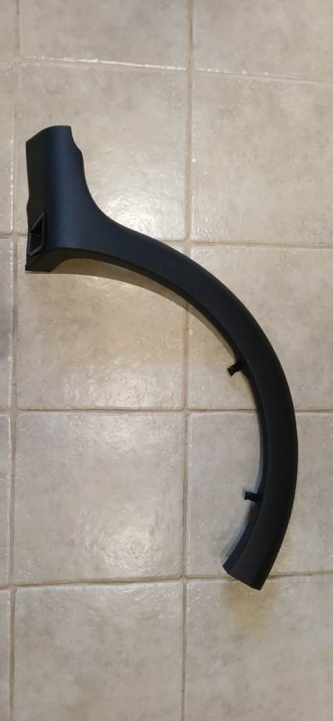 Dacia Sandero Stepway rear wheel arch trim. Nearside (left)