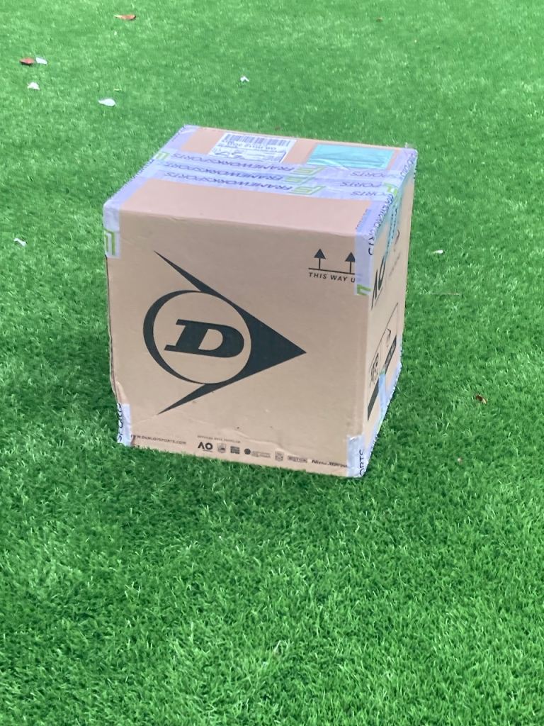 Box of 70 new green tennis balls 