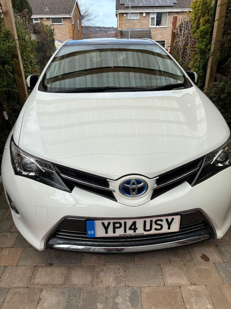 Beautiful white Toyota Auris 