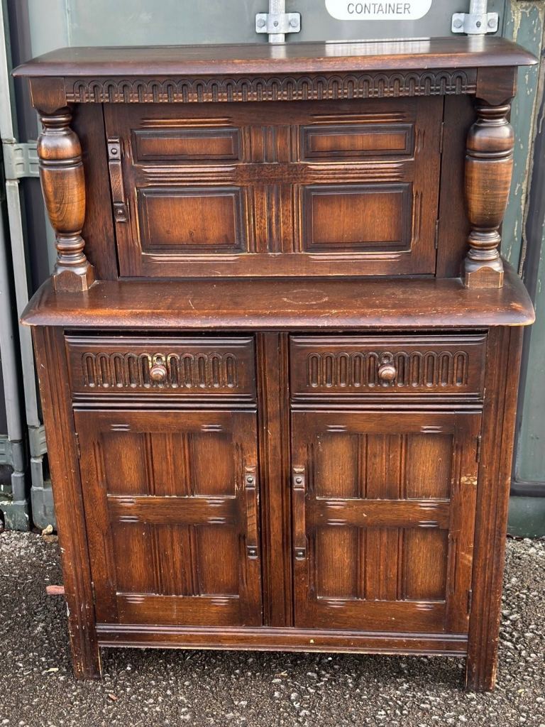 Dark wood Ercol Priory court cabinet