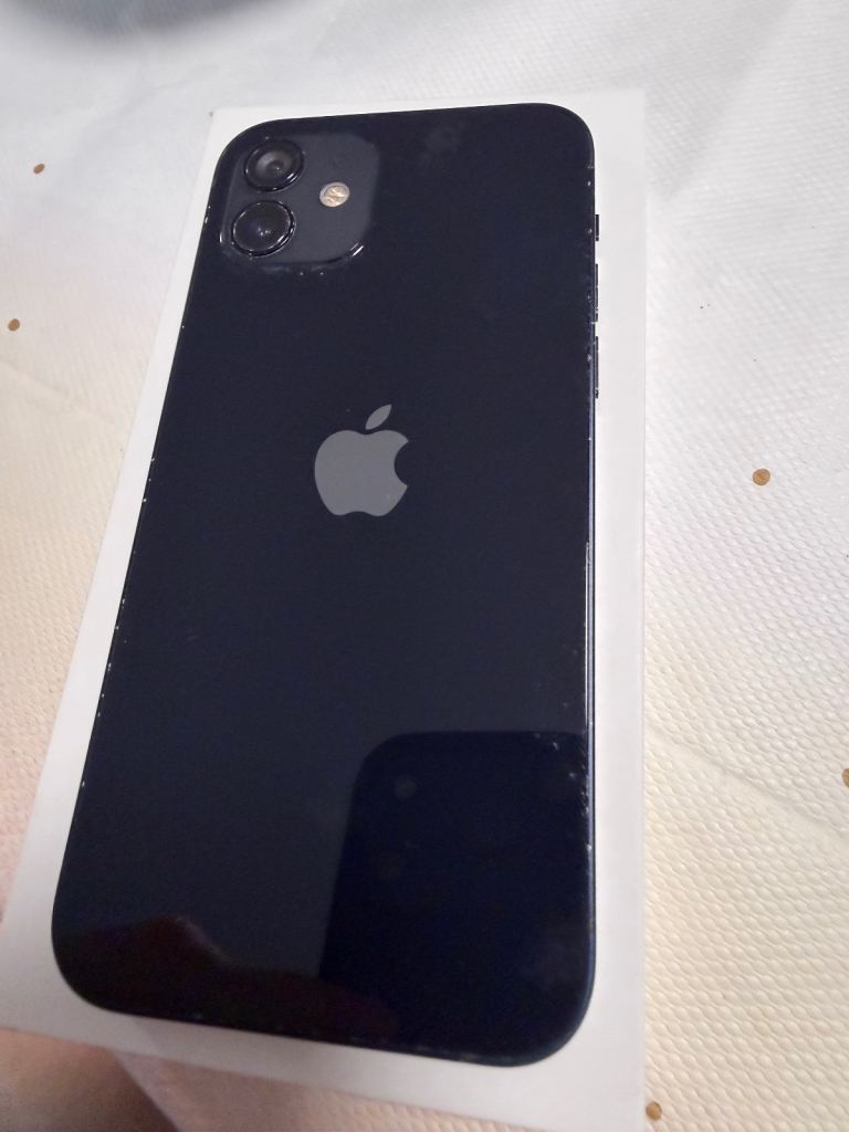 iPhone 12 in Midnight Black, in good condition. 90% battery health