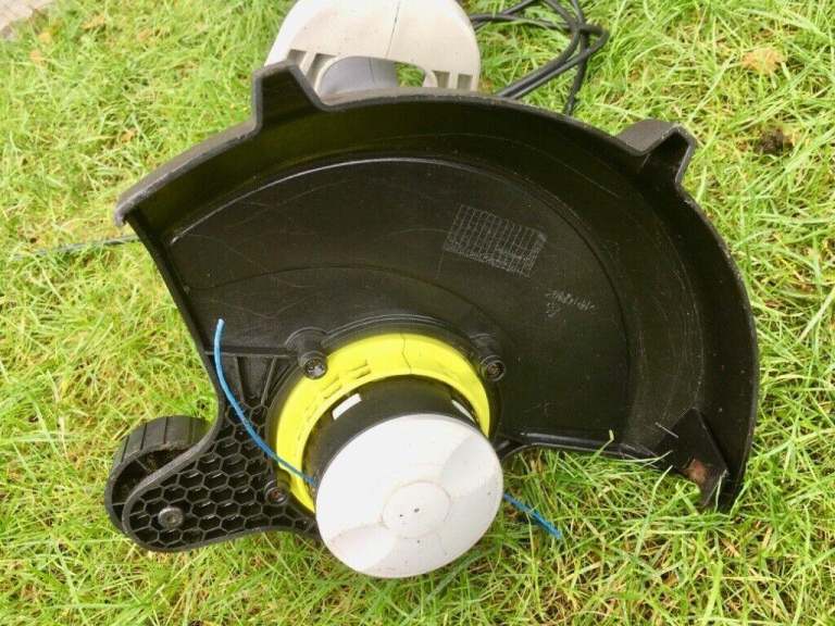  Strimmer:-  Ryobi Easy Edge 600w RLT 6033