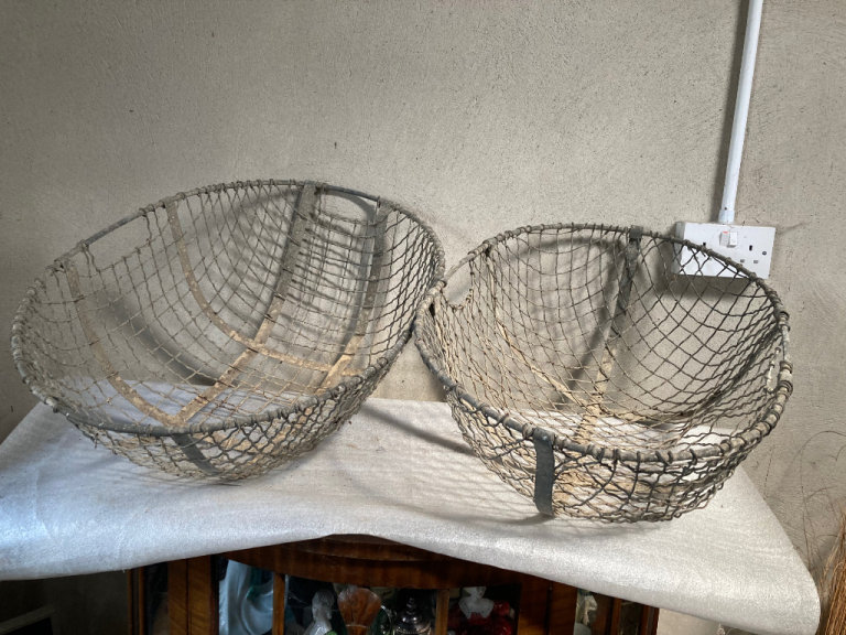 Vintage Metal potato gathering baskets.