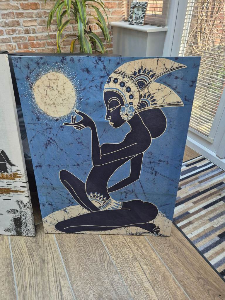 Four batik pictures on wooden frames