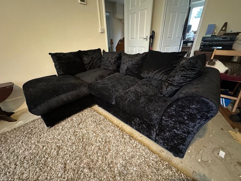 Large black corner sofa