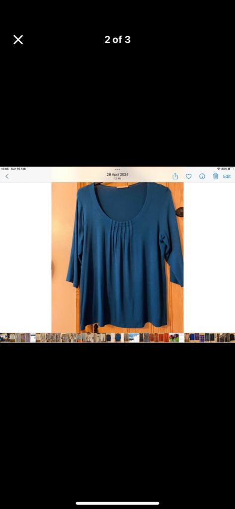 Unusual Ladies 3/4 length sleeve top. By Marks and Spencer.