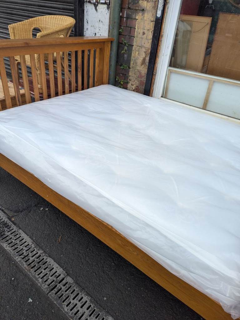 image for Wooden king-size bed with new mattress 