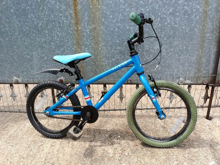 RALEIGH 16 INCH WHEEL CHILDS BIKE (BLUE)£50 ALLOY V BRAKES AND LEVERS,REAR MUD GAURD .NON SLIP PEDAL