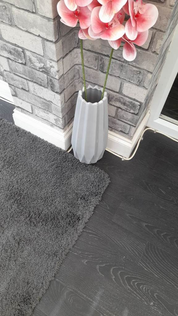 Tsll grey glass vase and flowers