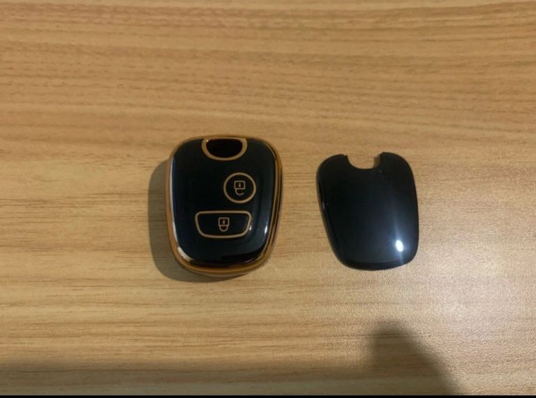 Oatsbasf black and gold TPU car key cover for various Peugeot & Citroen models.